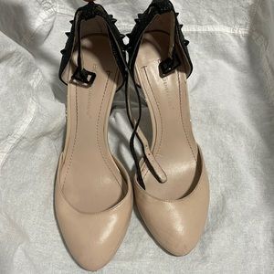 BCBG beige and black with spiked heels.
